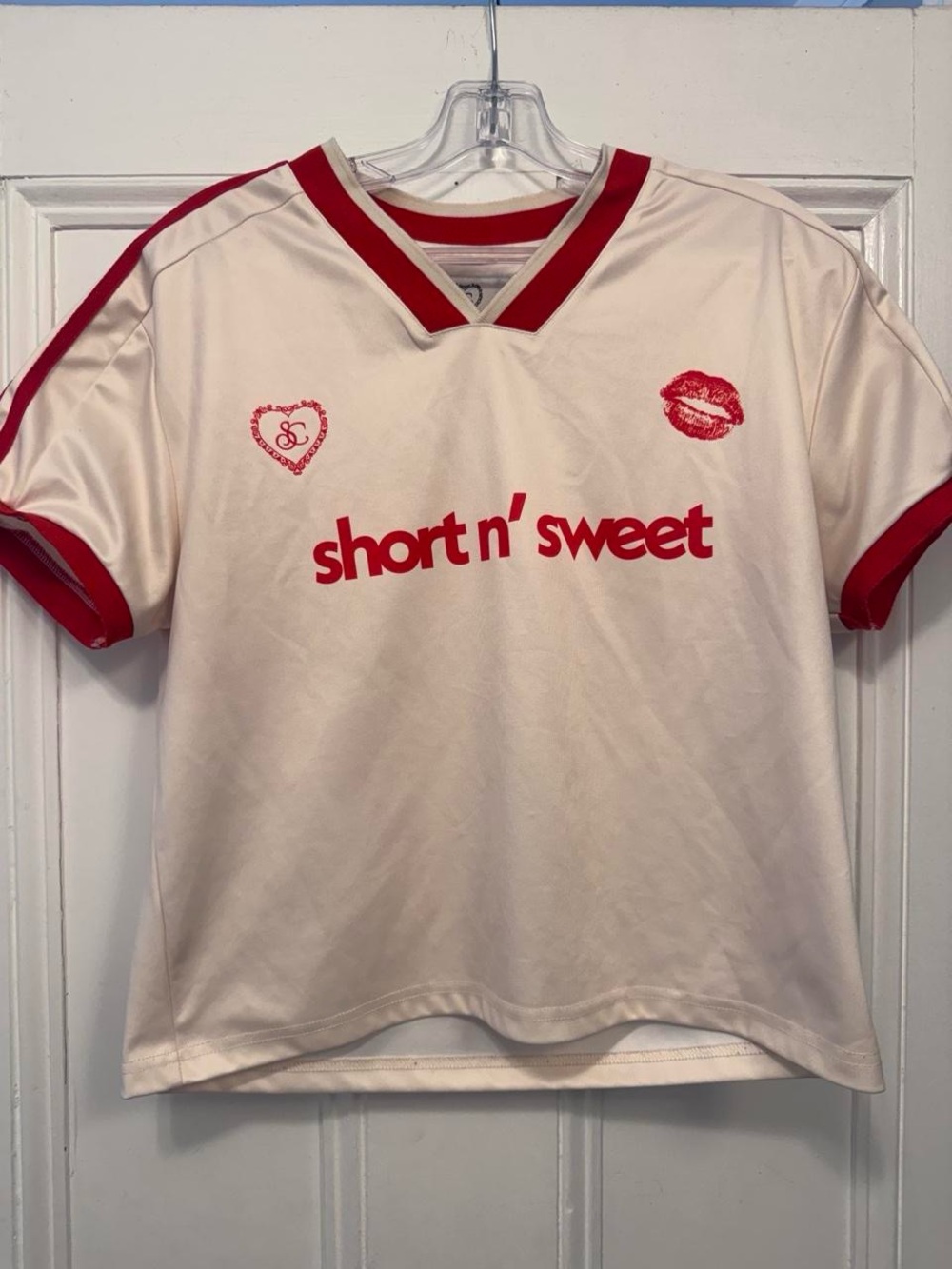 Sabrina Carpenter Official Short n' Sweet Merch Cream & Red Graphic Jersey Top